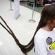 Set of Pictures for sale - world record for longest hair extension - pic 1